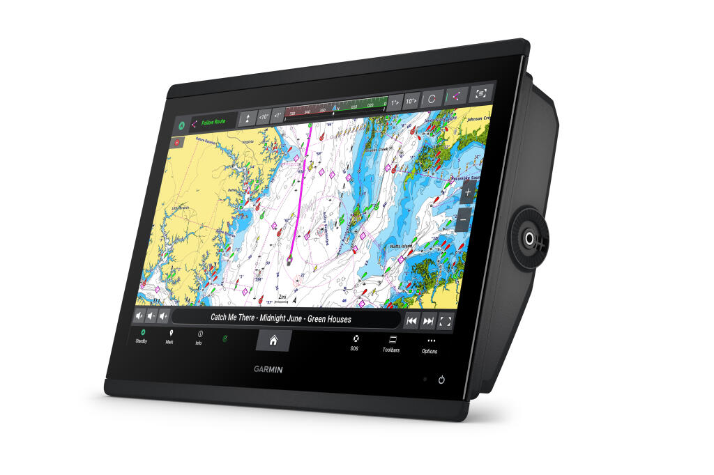 Garmin GPSMAP marine GPS display showing colorful nautical chart with navigation data and fish locations