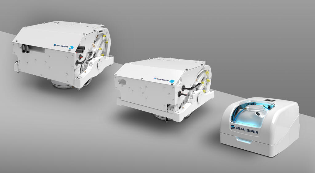 Three white Seakeeper gyroscopic stabilization systems in different sizes displayed against gray background