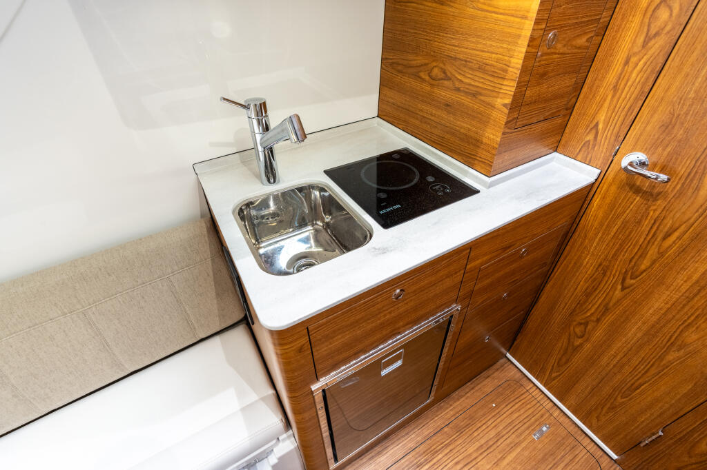 Detail image of Full Galley w/ Microwave, Cooktop & Refrigerator