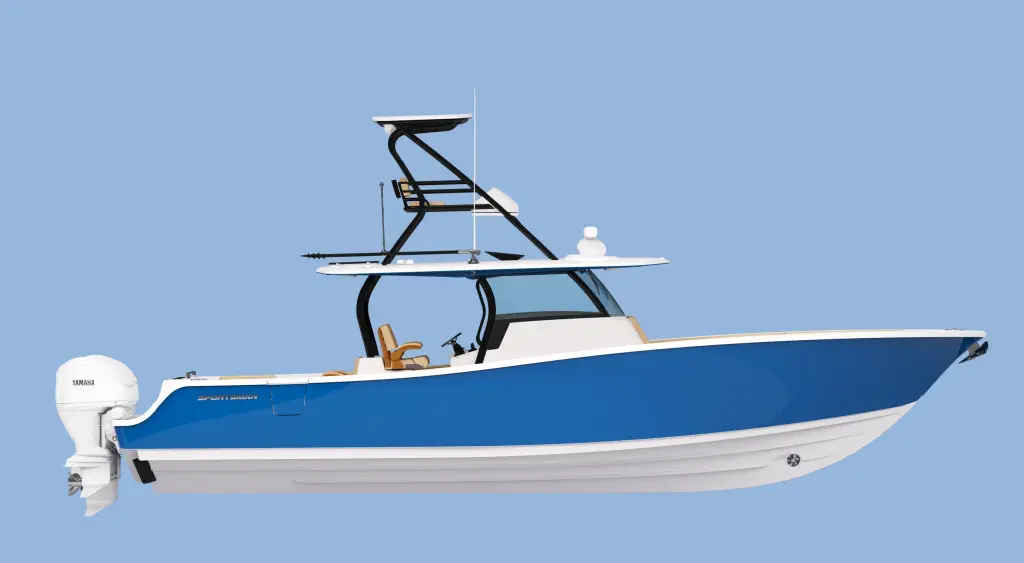 Blue and white sportfishing boat with tower and outboard engine against clear sky