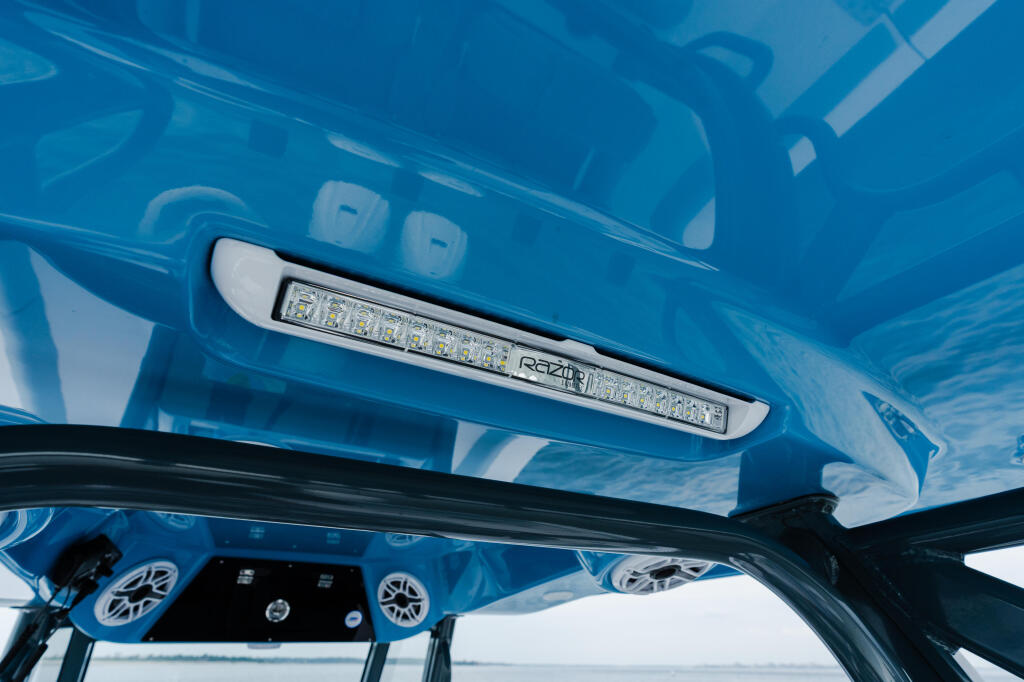 LED lighting strip mounted on hardtop interior of boat cabin