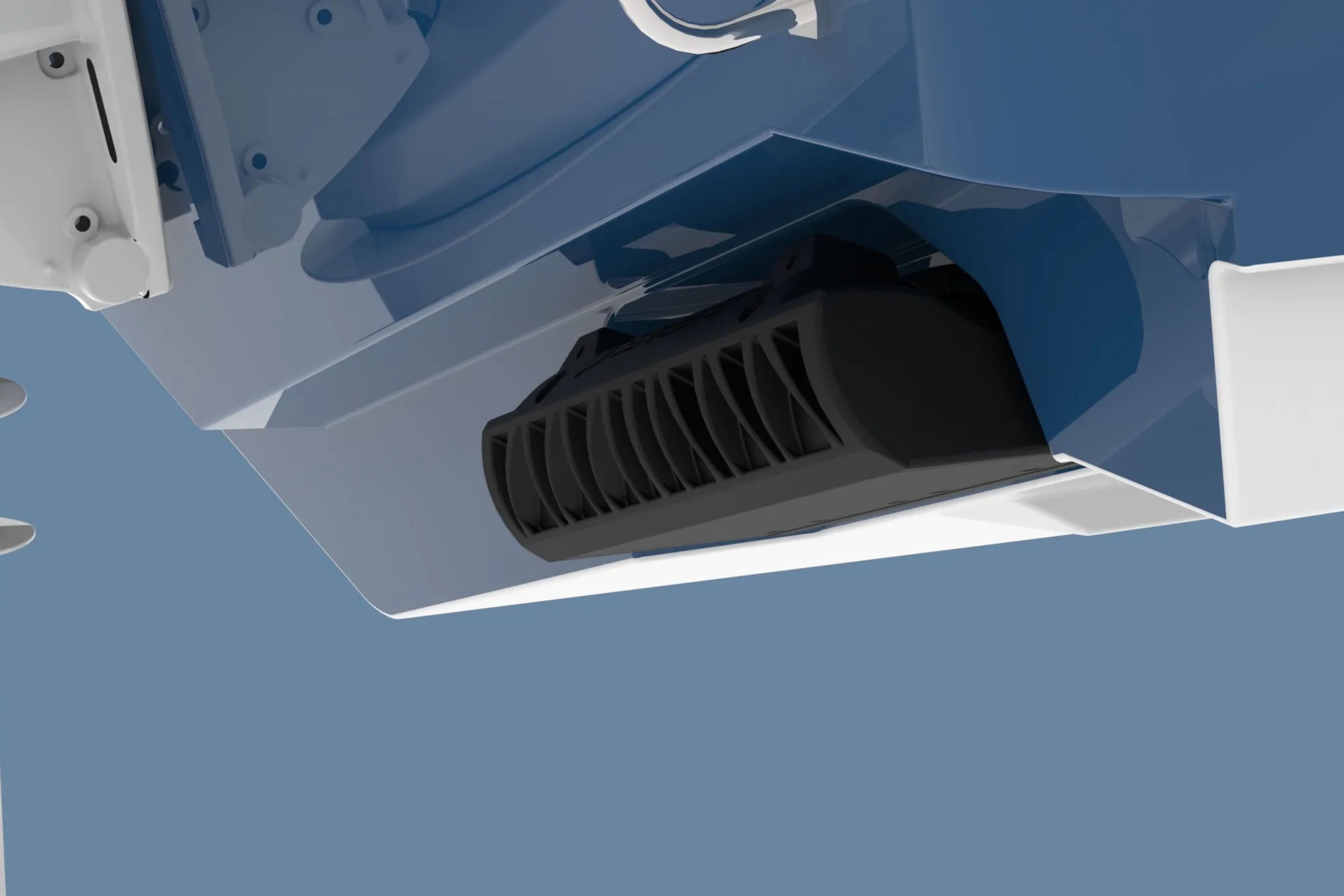 Close-up of a black intake or exhaust component mounted in a white storage compartment on a boat hull