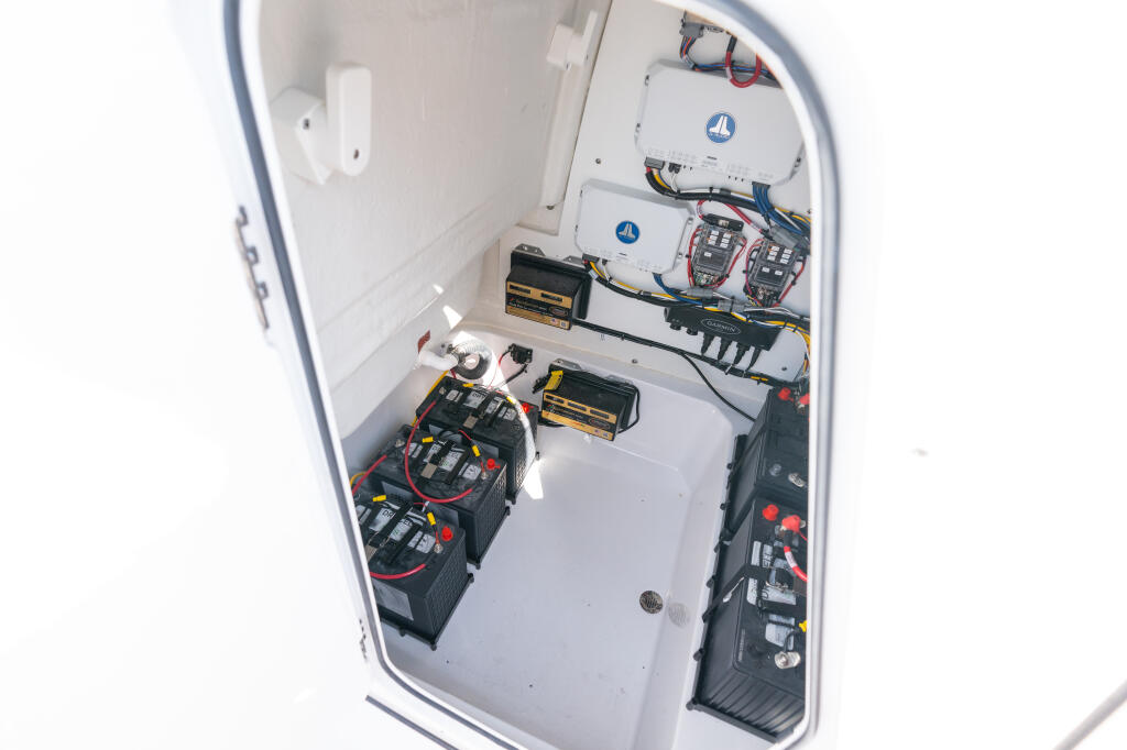 Engine compartment showing batteries, fuses, circuit breakers, and electrical wiring systems