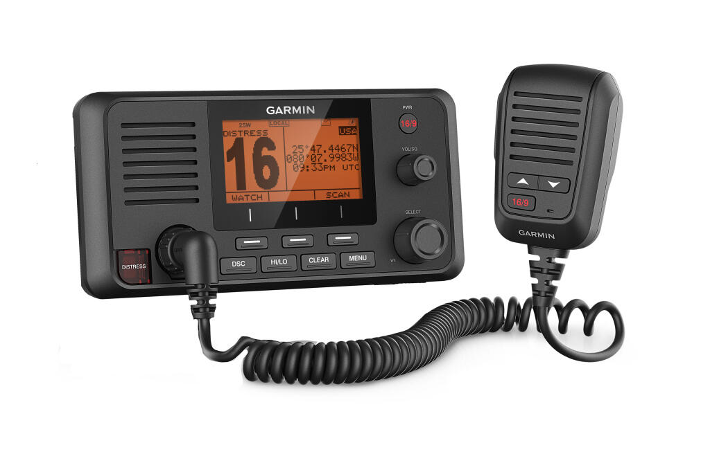 Garmin VHF 215 marine radio with orange display showing distress signal and connected microphone handset