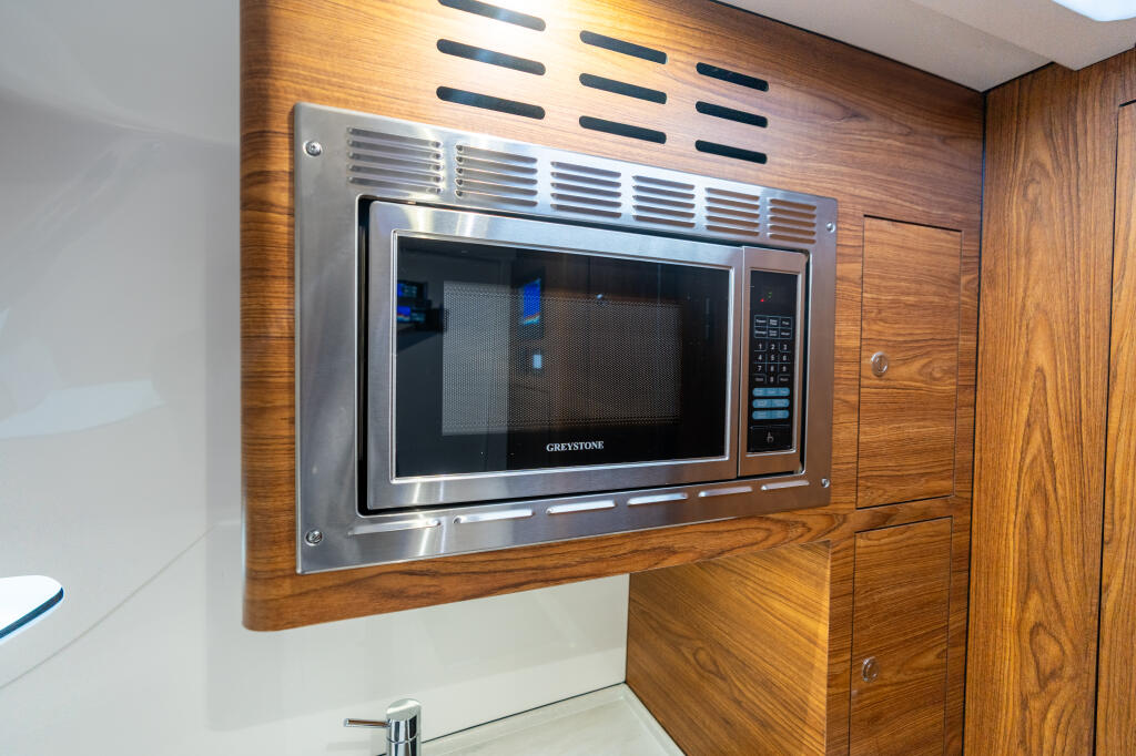 Detail image of Full Galley w/ Microwave, Cooktop & Refrigerator