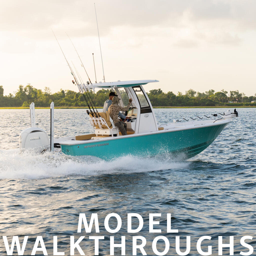 Turquoise and white fishing boat with hardtop running through shallow coastal water with fishing rods mounted