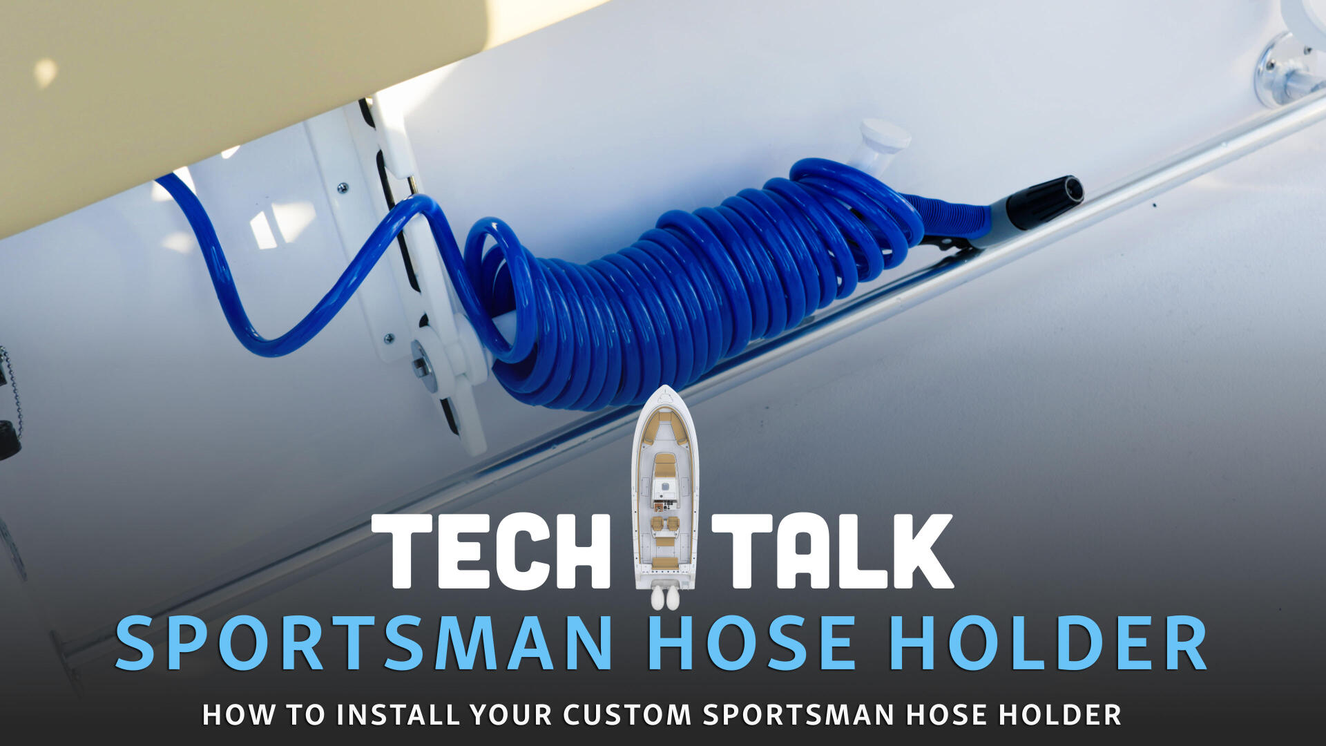 Blue coiled hose holder mounted on white boat gunwale with storage compartment