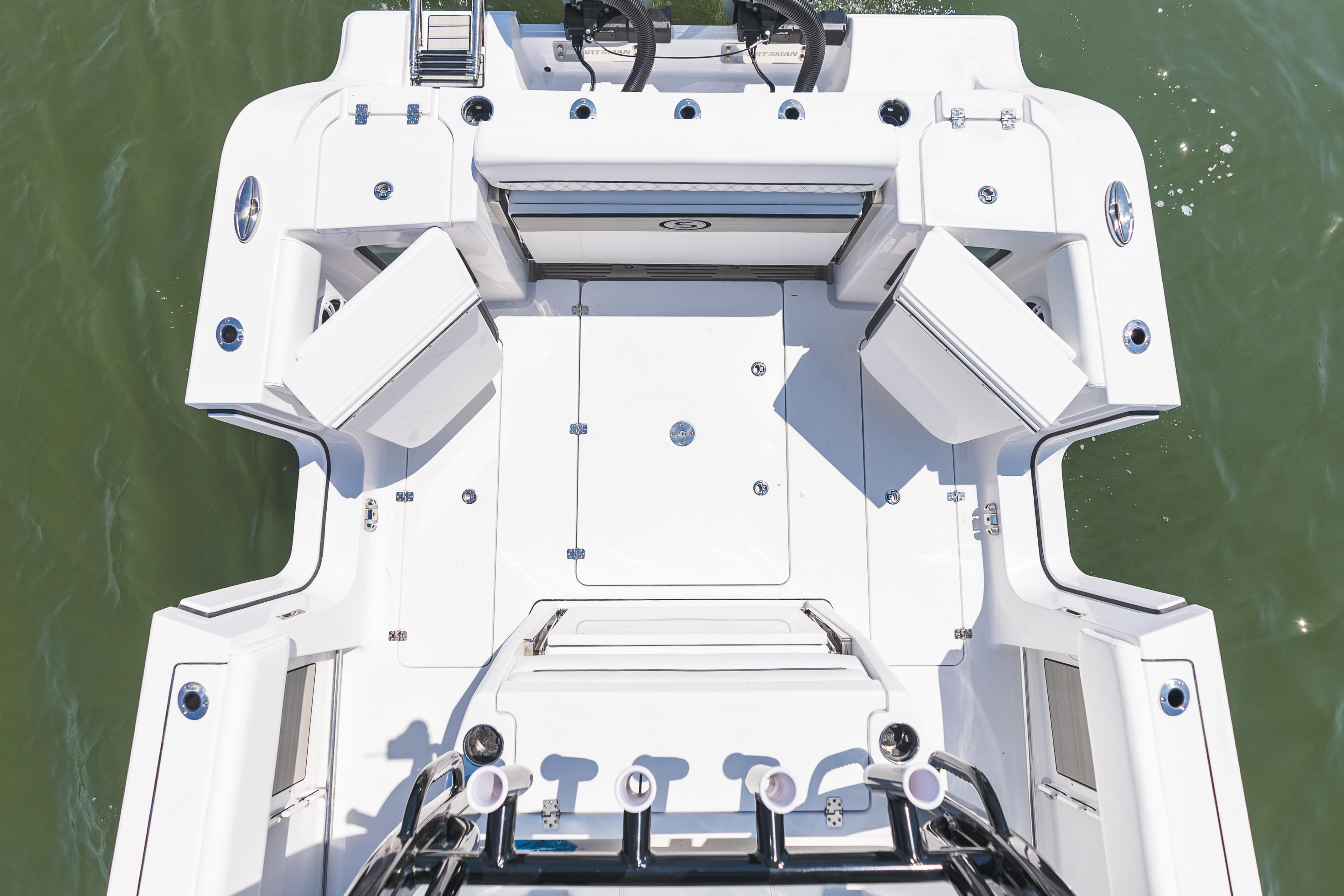 Overhead view of a white center console boat with dual helm seats and open cockpit layout