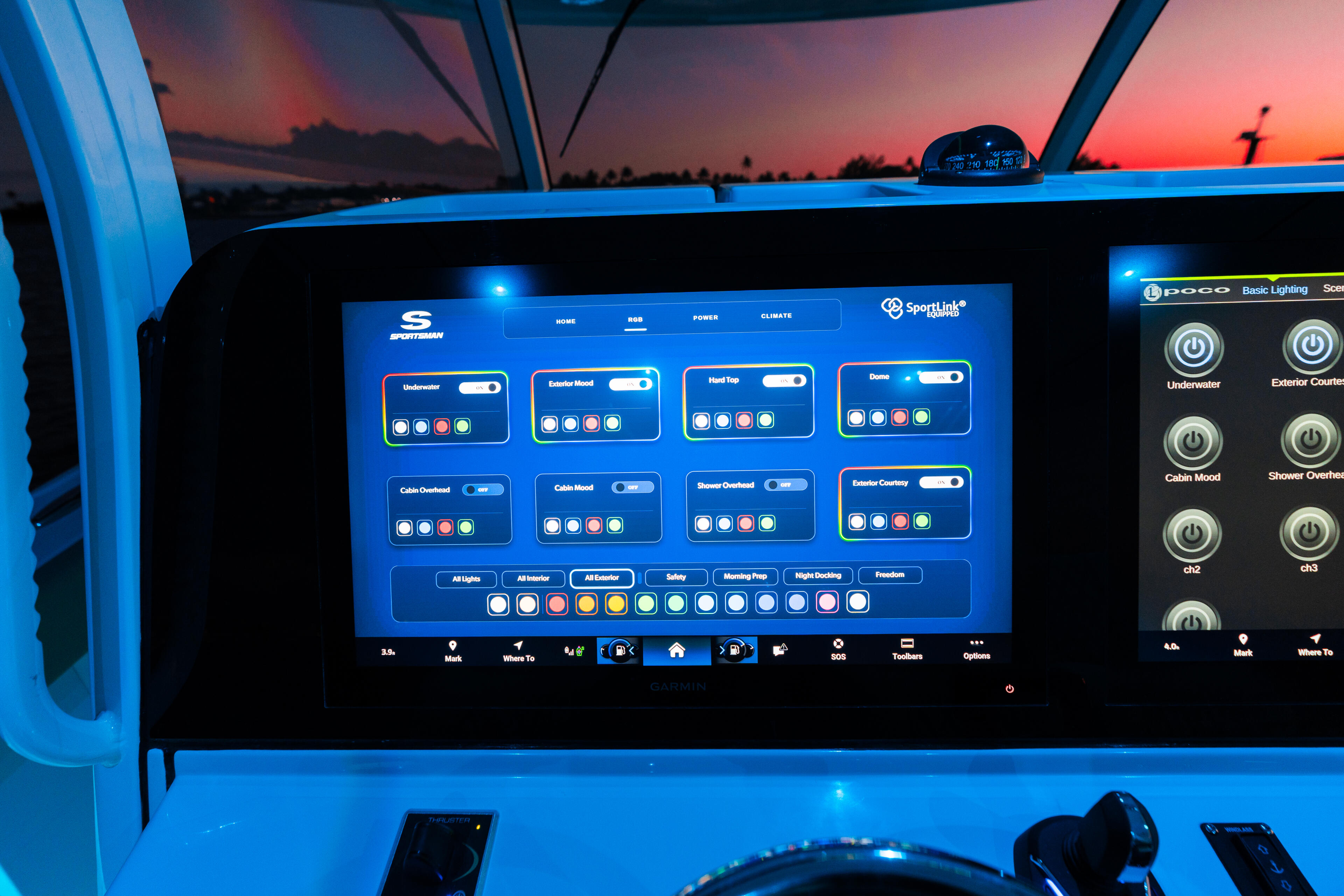 Sportsman boat helm displays customizable RGB lighting control interface at sunset