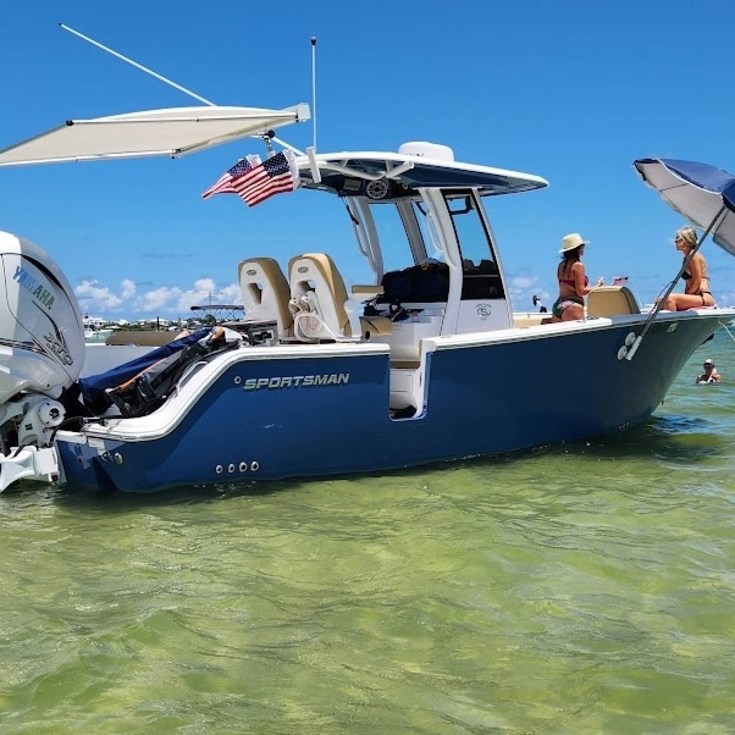 Title: Sandbar on the 4th - On board their Sportsman Heritage 261 Center Console - Location: Orange Beach Alabama. Participating in the Photo Contest #SportsmanJuly2024
