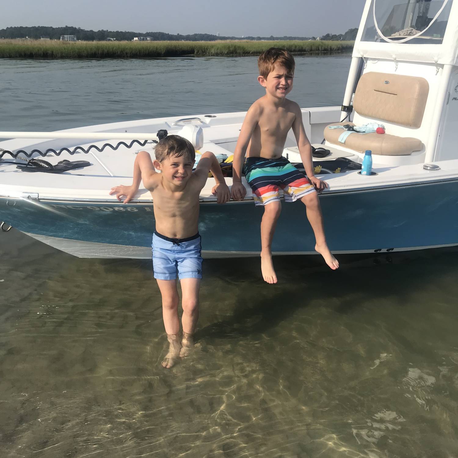 Title: Hanging at the sandbar - On board their Sportsman Masters 227 Bay Boat - Location: Virginia Beach. Participating in the Photo Contest #SportsmanNovember2024