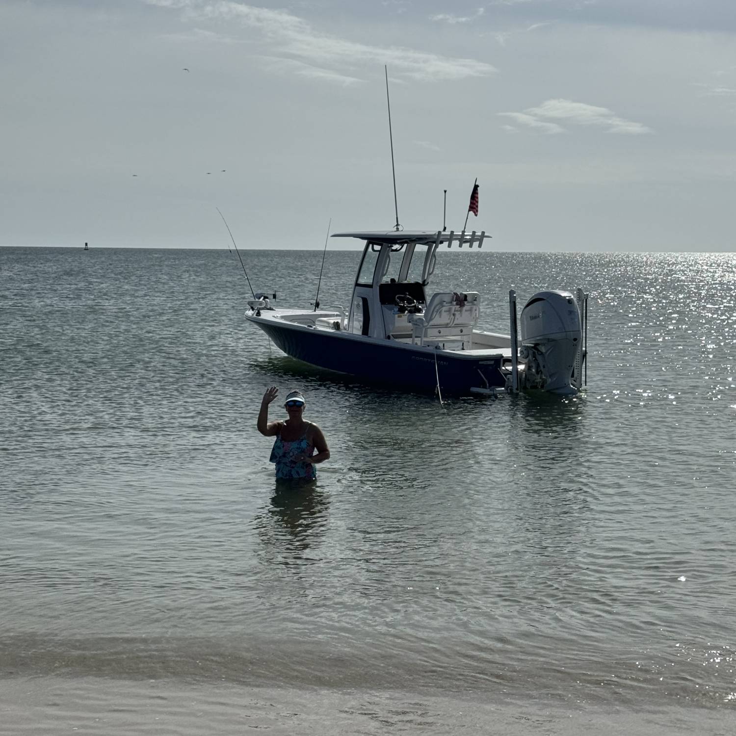 Buster our Boxer loves to ride more than us! Parking at the sand bar for some lunch after a day...