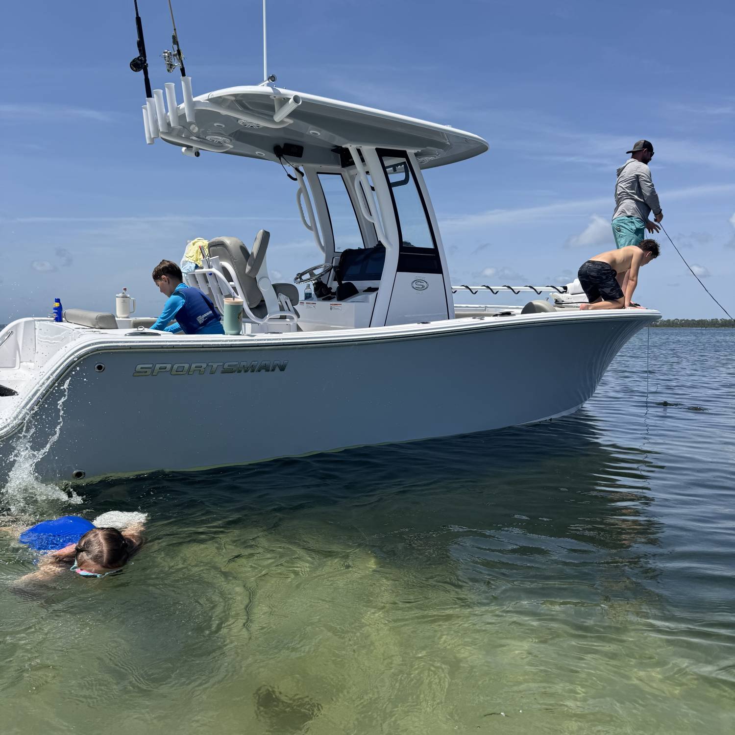 Title: Fishin and swimmin - On board their Sportsman Open 212 Center Console - Location: Shell Island. Participating in the Photo Contest #SportsmanAugust2025