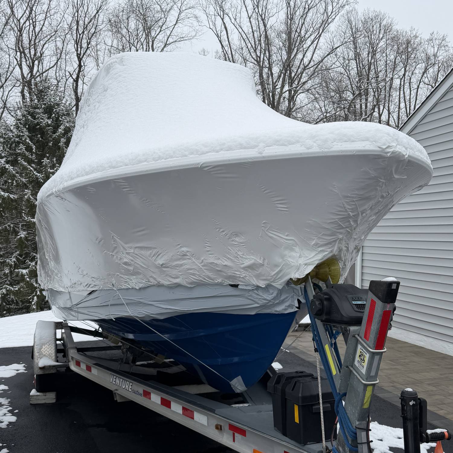 After winterization, the JASE’ is napping under a light snow and waiting for spring