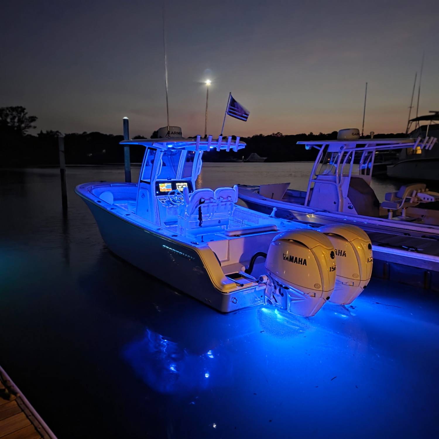 Title: Nighttime Bliss - On board their Sportsman Open 252 Center Console - Location: Aquebogue, Long Island NY. Participating in the Photo Contest #SportsmanJuly2025