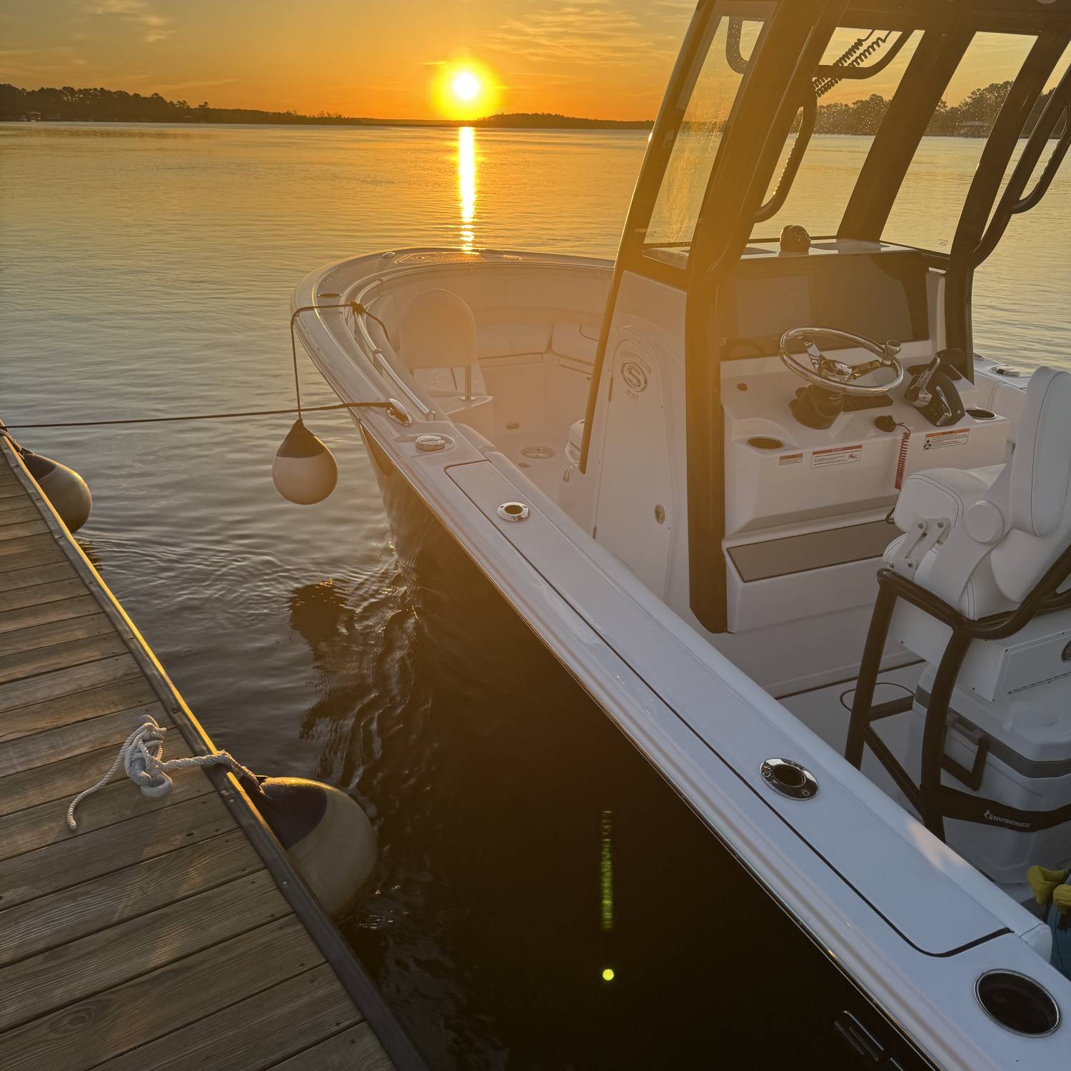 Title: Her First Sunrise - On board their Sportsman Heritage 231 Center Console - Location: Wando River. Participating in the Photo Contest #SportsmanJuly2025