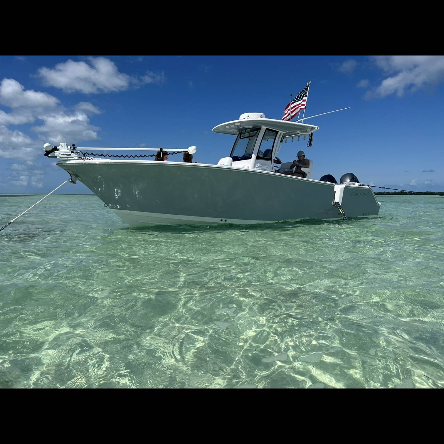 Title: Clear Water - On board their Sportsman Heritage 261 Center Console - Location: Content Passage, Content Key. Participating in the Photo Contest #SportsmanOctober2025