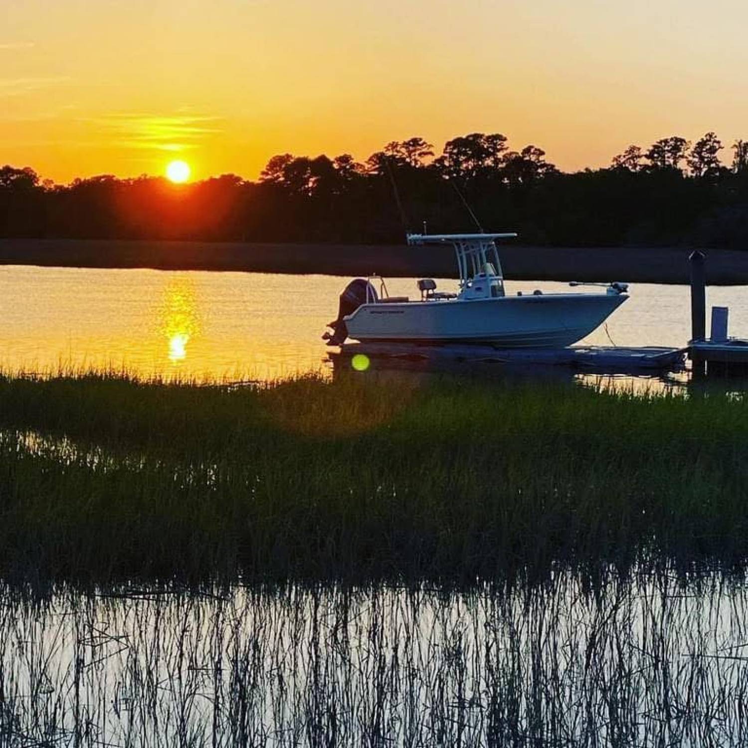 My view every night at sunset with my beautiful boat on the lift