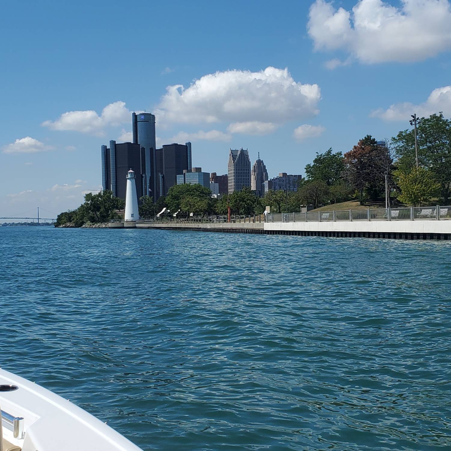 Title: Heading to Downtown Detroit for lunch. - On board their Sportsman Heritage 261 Center Console - Location: Detroit River. Participating in the Photo Contest #SportsmanSeptember2025