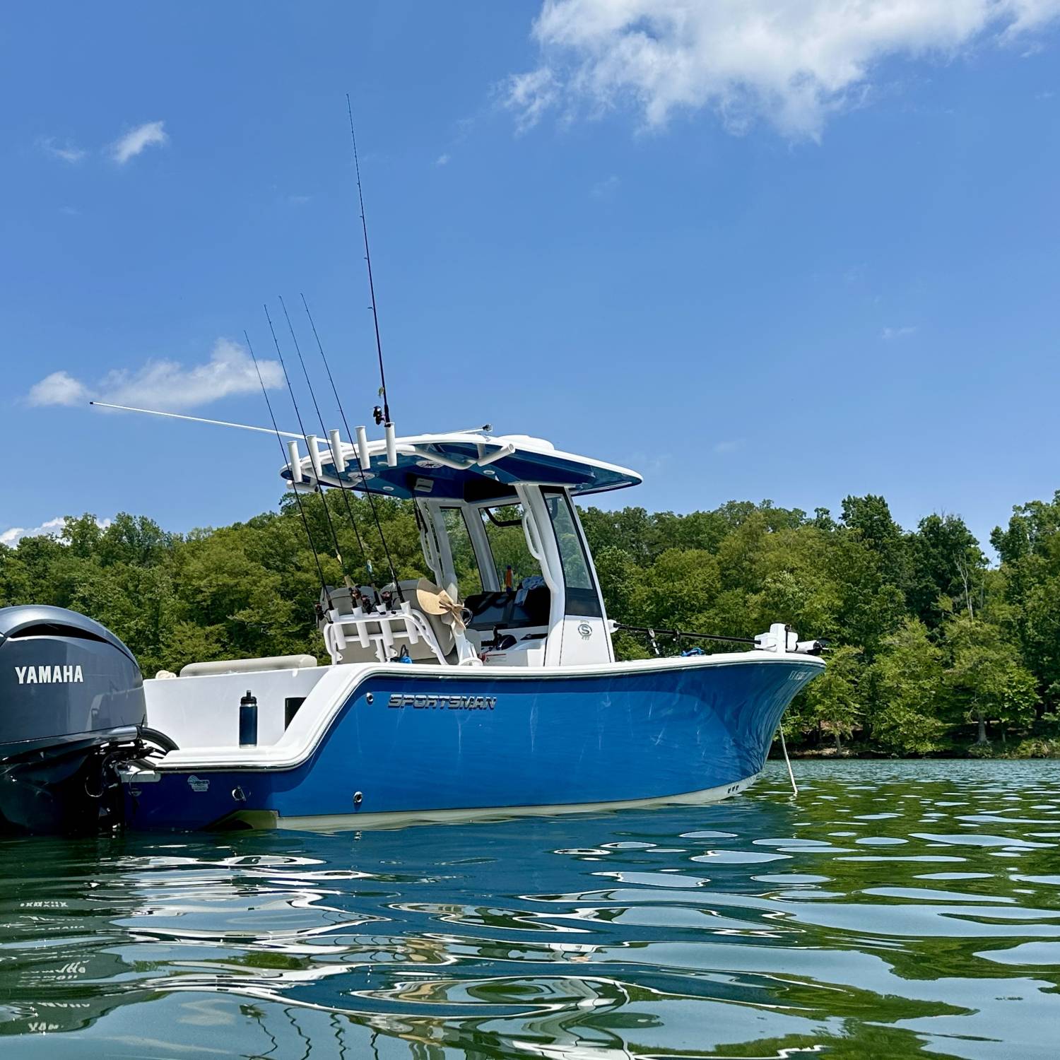 Title: Everything We Need - On board their Sportsman Open 232 Center Console - Location: Smith Mountain Lake Virginia. Participating in the Photo Contest #SportsmanSeptember2025