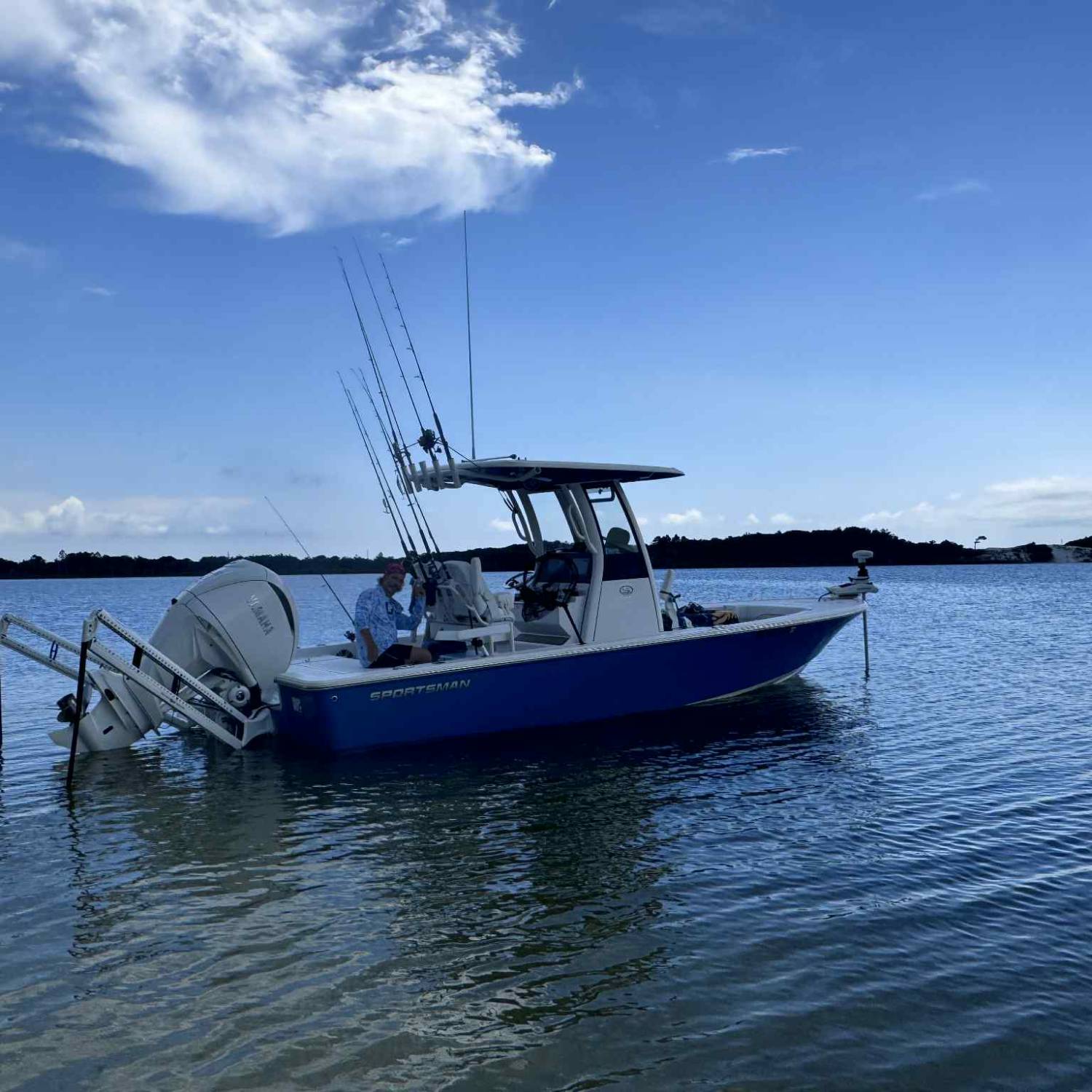 Title: Taking a break - On board their Sportsman Masters 247OE Bay Boat - Location: Destin Florida. Participating in the Photo Contest #SportsmanApril2026