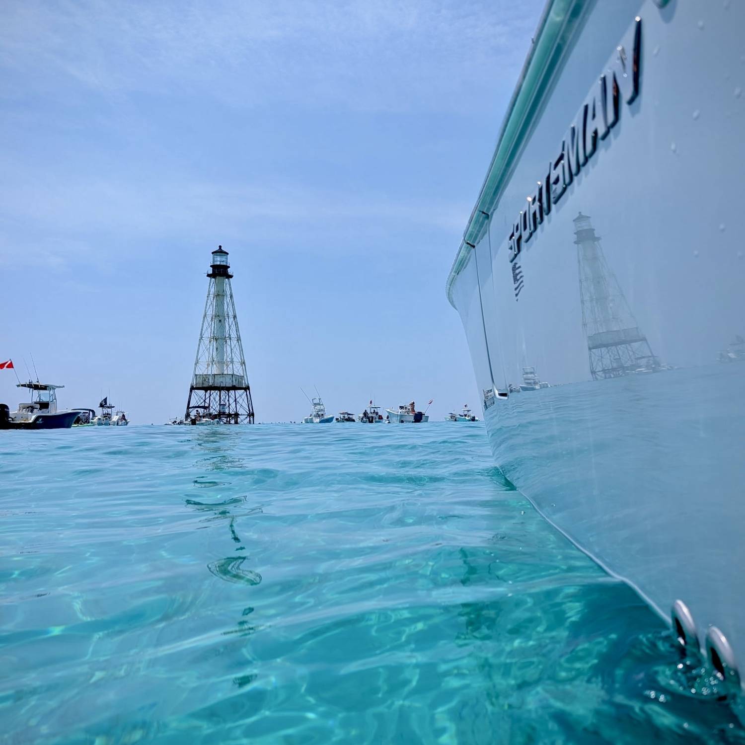 Title: Day trip to Alligator Reef in the Keys - On board their Sportsman Heritage 261 Center Console - Location: Alligator Reef - Florida Keys. Participating in the Photo Contest #SportsmanAugust2026
