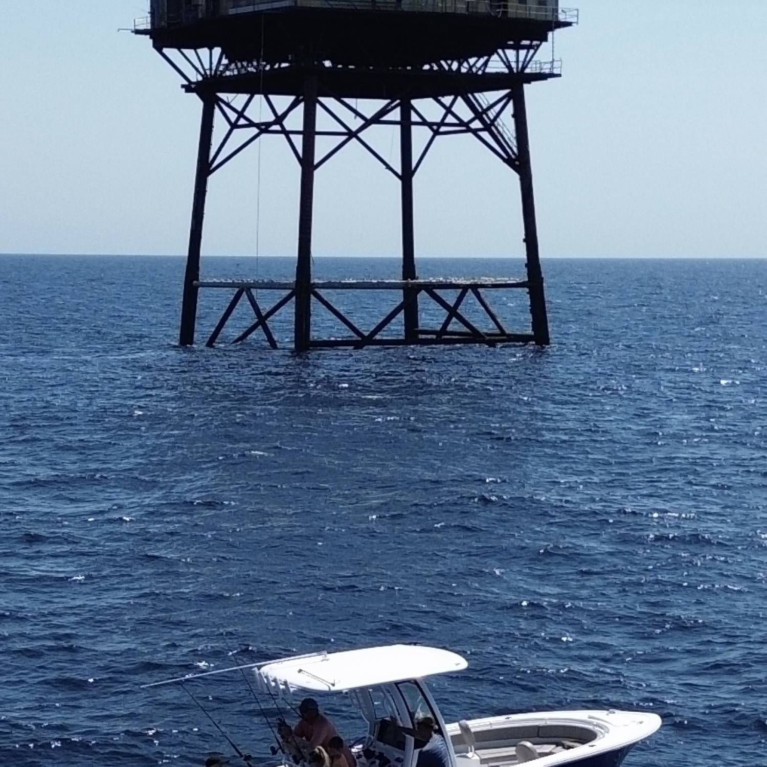 Title: Frying Pan Tower - On board their Sportsman Heritage 231 Center Console - Location: Frying Pan Tower off the coast of Southport NC. Participating in the Photo Contest #SportsmanJanuary2026