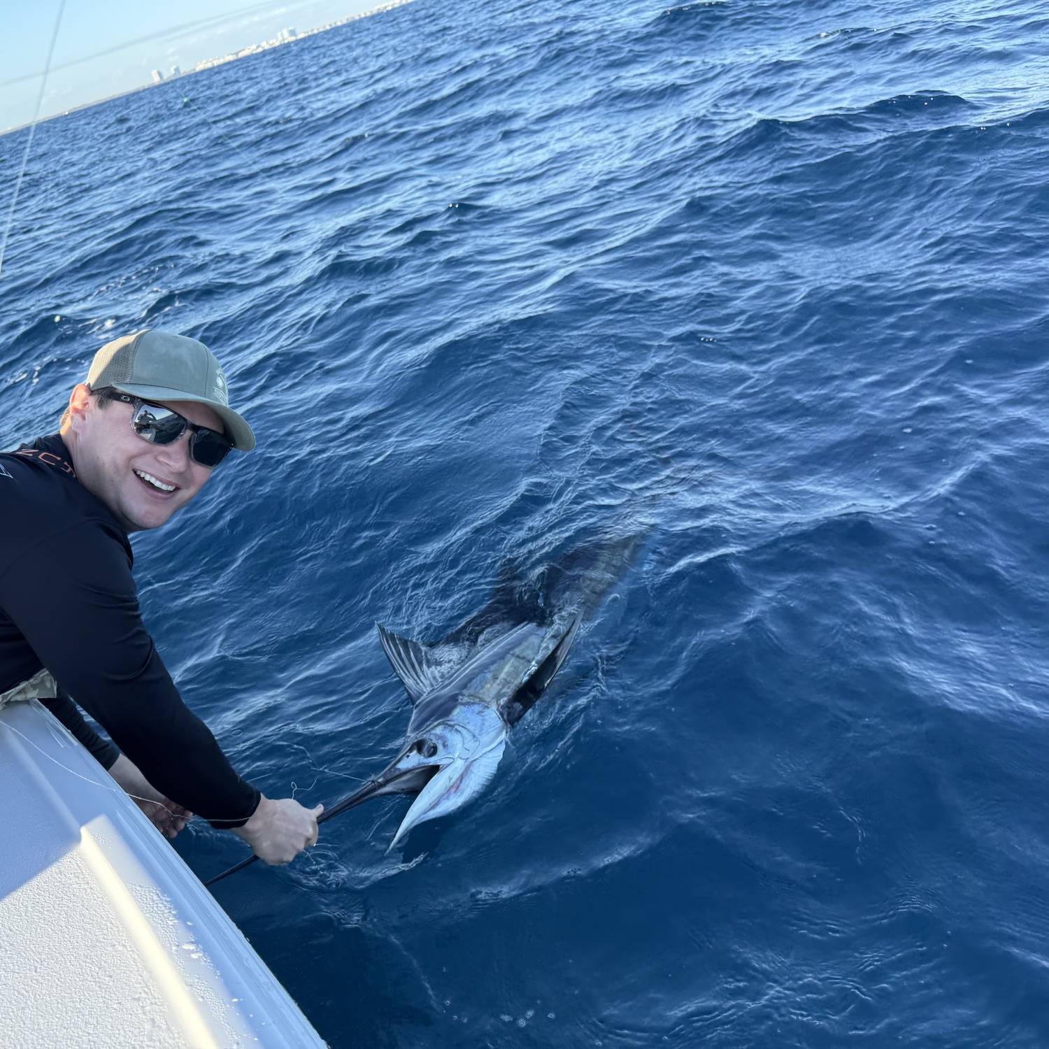 Title: SoFlo Sail - On board their Sportsman Masters 247OE Bay Boat - Location: Palm Beach, Florida. Participating in the Photo Contest #SportsmanMarch2026