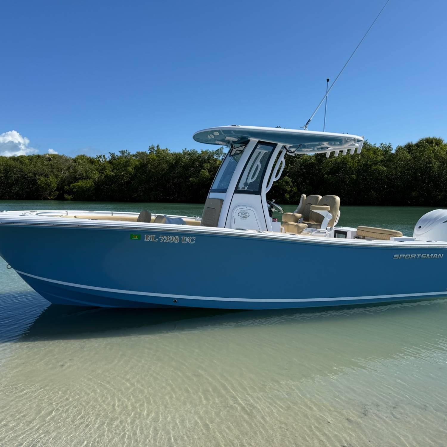 Title: Our New Baby! - On board their Sportsman Open 232 Center Console - Location: Vero Beach Florida. Participating in the Photo Contest #SportsmanMay2026