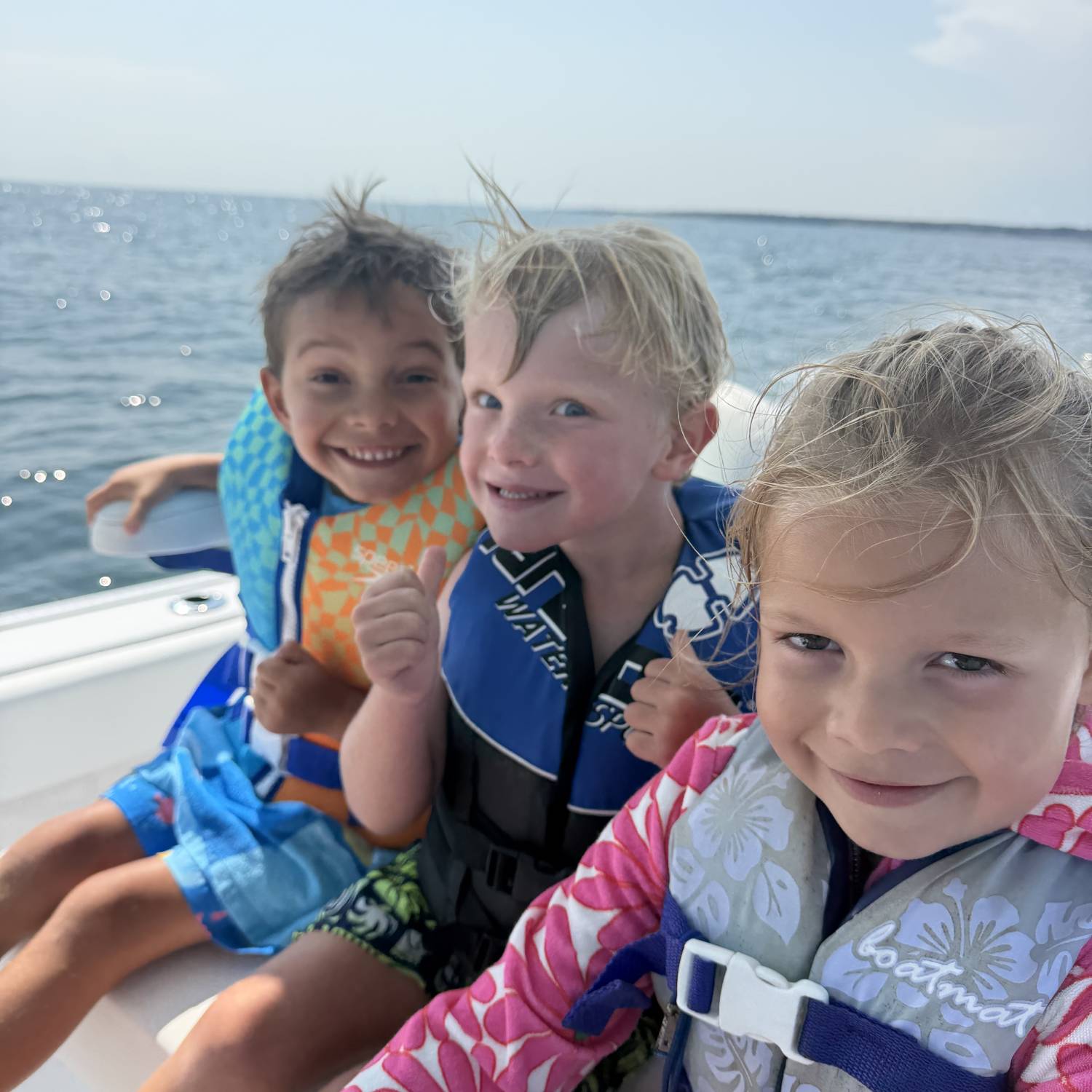 My 3 Grandchildren having fun on the open water